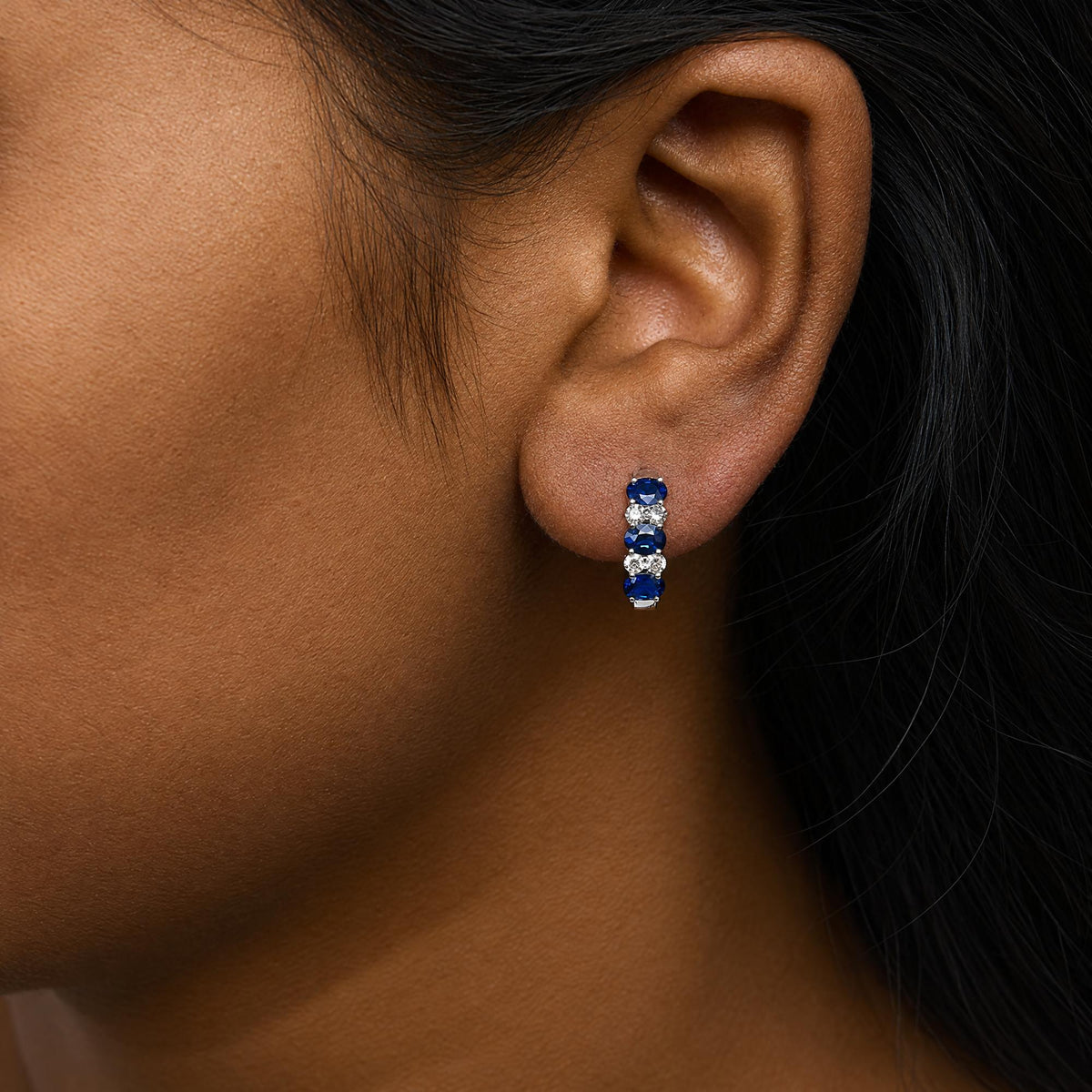 10K White Gold 1/4 Cttw Diamond and Oval Blue Sapphire Alternating Huggie Hoop Earrings